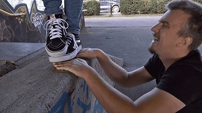 Palms Trampled Under Vans In The Skate Park