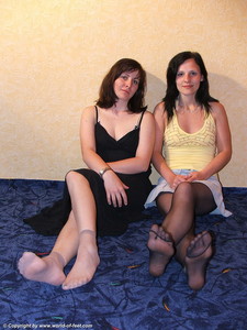 Taking Off Each Others Footwear And Nylon Stockings