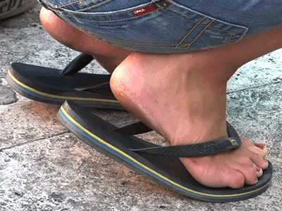 Candid Tourist Feet In Roll Flops